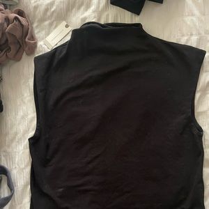 Black mock neck blouse. Size M.